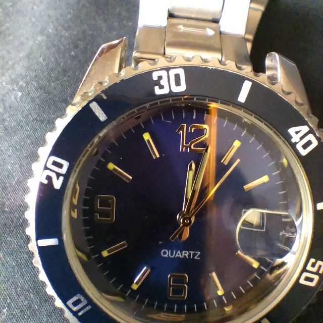 Relógio de pulso quartz azul e dourado