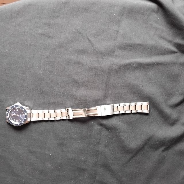 Relógio de pulso quartz azul e dourado