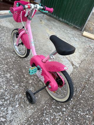 Bici niña 14 Btwin rosa con cesta  buen estado