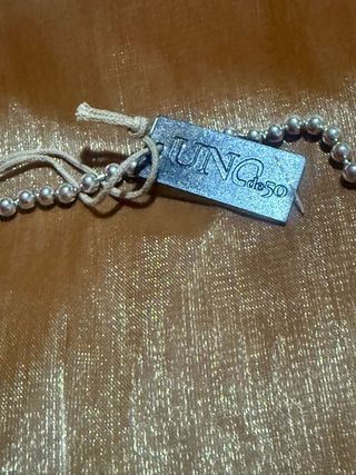 Collar Cruz Uno de 50 Plata

