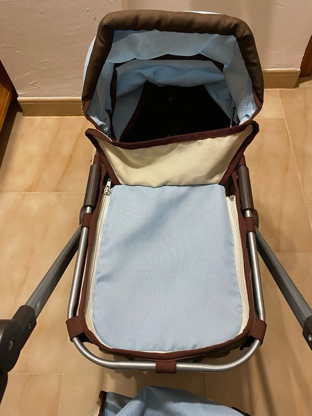 Cochecito de muñecas azul y marrón,El Corte Inglés