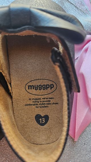 Scarpine neonata nere con fiocco