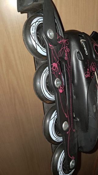 Patines Oxelo negros con detalles rosas