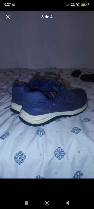 Zapatos de seguridad azules, buena calidad.
Oriocx