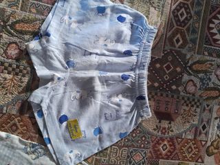Pantaloncini bimbi azzurri con orsetti