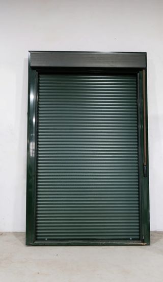 Balconera aluminio verde abatible