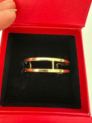 Pulsera Carolina Herrera Dorada