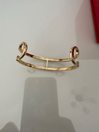 Pulsera Carolina Herrera Dorada