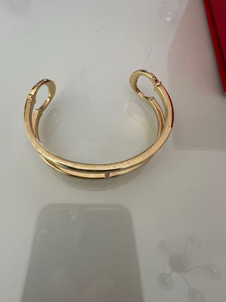 Pulsera Carolina Herrera Dorada