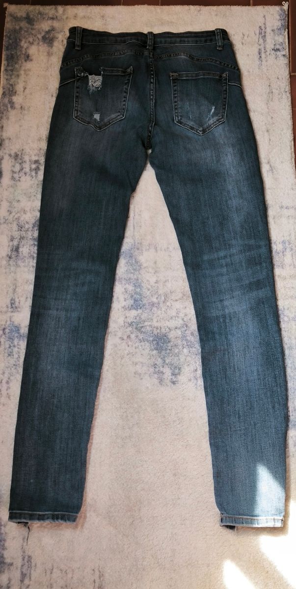 Jeans strappati taglia L