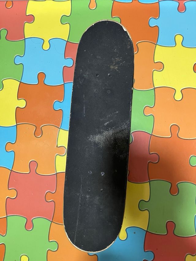 Skate Oxelo con diseño de demonio