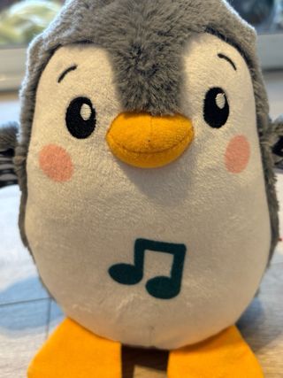 Pingüino musical de peluche suave Fisher Price