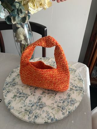 Bolso de mano crochet amarillo y coral