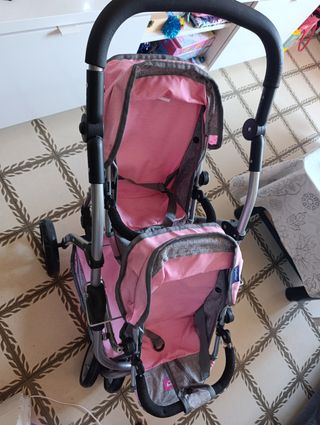 Carrito gemelar para muñecas rosa