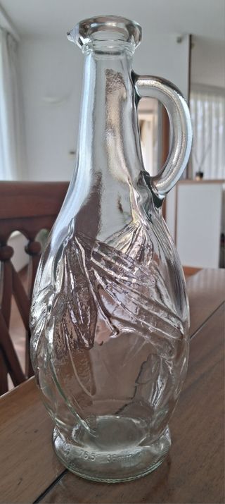 Caraffa in vetro antica con manico