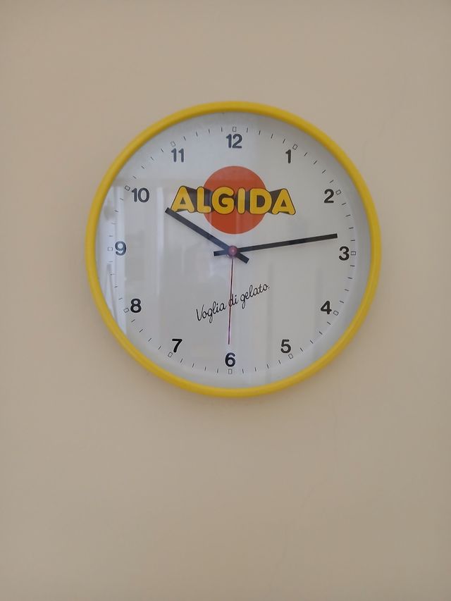 Orologio da parete giallo algida