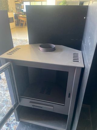 Estufa de leña de acero con cristal