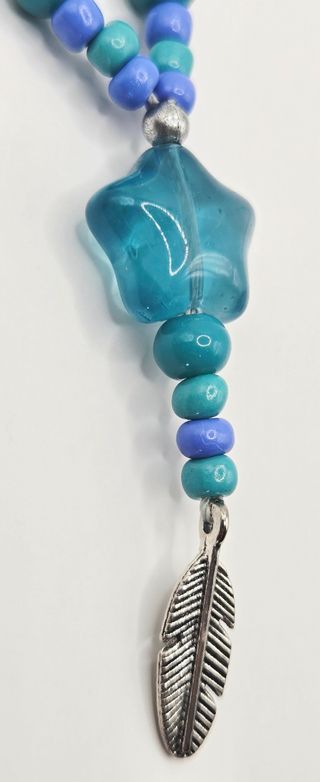 Girocollo e Orecchini Stella e Piuma 