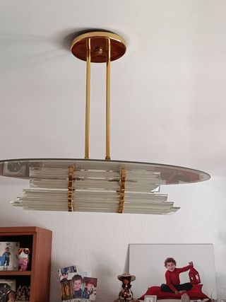 Lámpara de comedor dorada y Cristal.