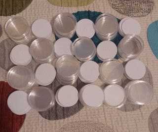 Cápsulas para monedas con almohadilla