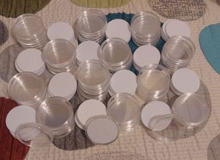 Cápsulas para monedas con almohadilla