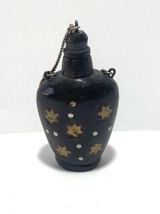 Snuff bottle orientale con motivi a stella