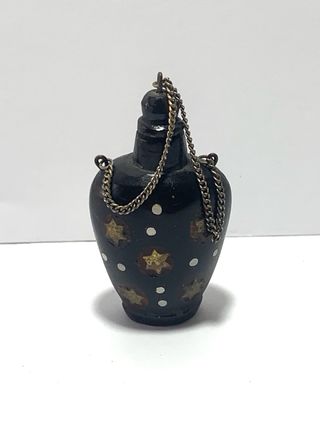 Snuff bottle orientale con motivi a stella