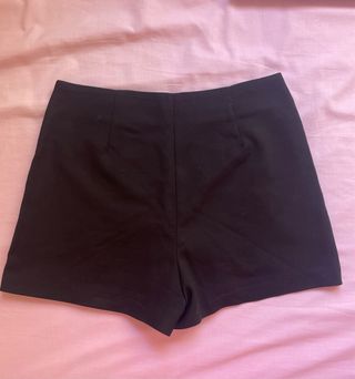 Falda pantalón con volante negro