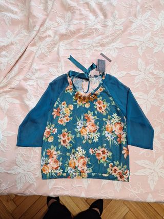 Blusa elegante floral manga transparente