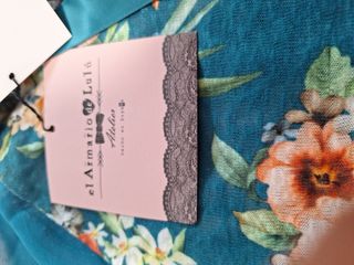 Blusa elegante floral manga transparente