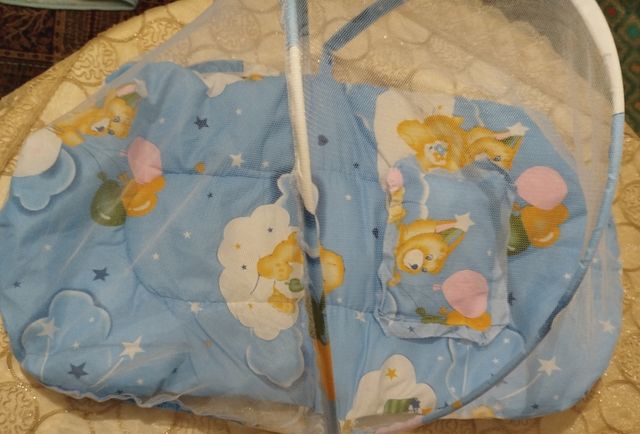 Zanzariera con materassino e cuscino