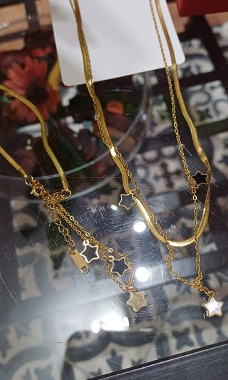 Conjunto Collar y Pulsera Estrellas Doradas