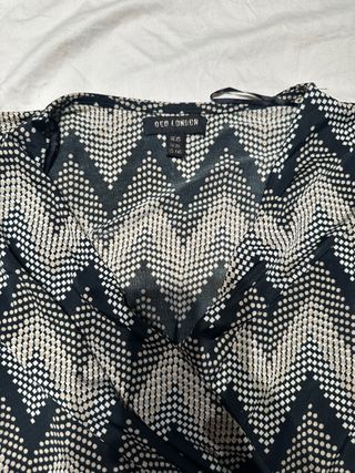 Mono QED LONDON Talla XS.
pero es tiende mucho 