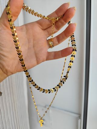 Collar de acero dorado y negro