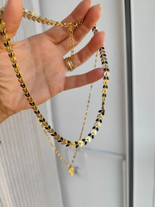 Collar de acero dorado y negro