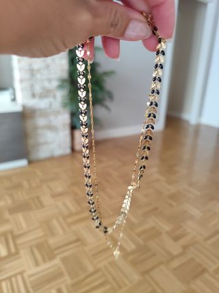 Collar de acero dorado y negro