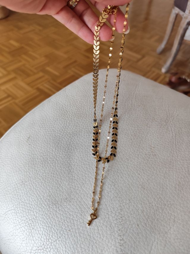 Collar de acero dorado y negro