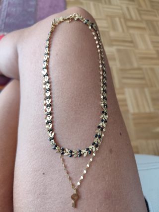 Collar de acero dorado y negro