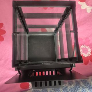 Farol de metal y cristal negro