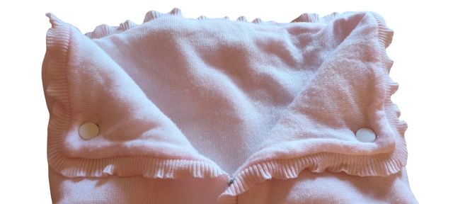 Sacco per bebè rosa con volant