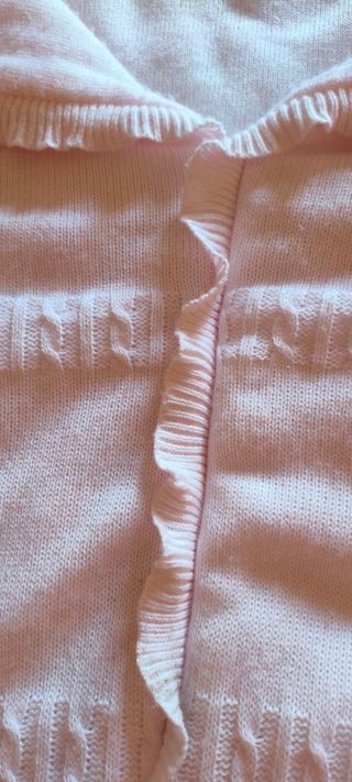 Saco bebé rosa con volantes