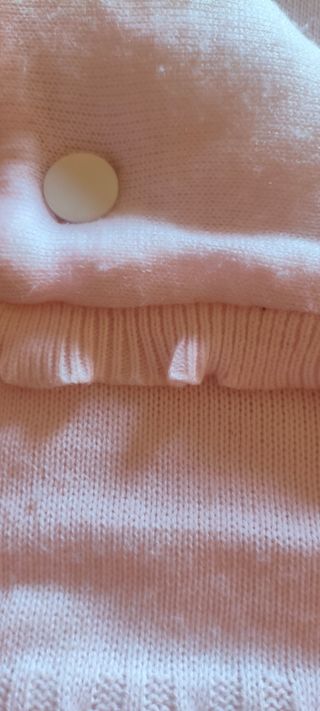 Saco bebé rosa con volantes