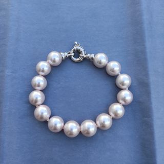 Pulsera de perlas. Color blanco -rosado