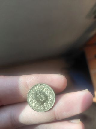 Moneda antigua con retrato