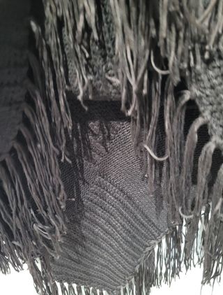 PONCHO DE PUNTO MARRÓN.