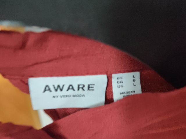 Blusa burdeos con abertura