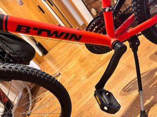 Bicicleta infantil naranja hasta 13 años