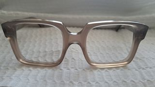 Montura gafas pasta marrón y gris.