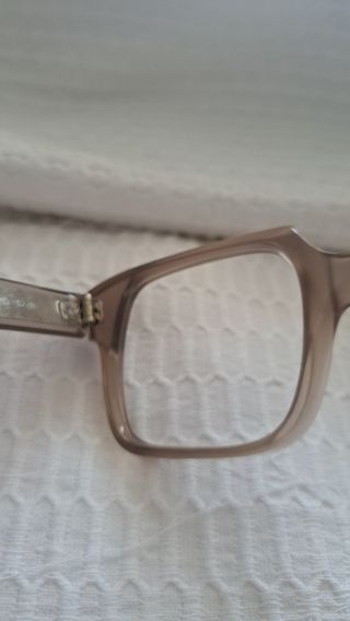 Montura gafas pasta marrón y gris.