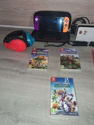 Nintendo Switch OLED White + Giochi e accessori